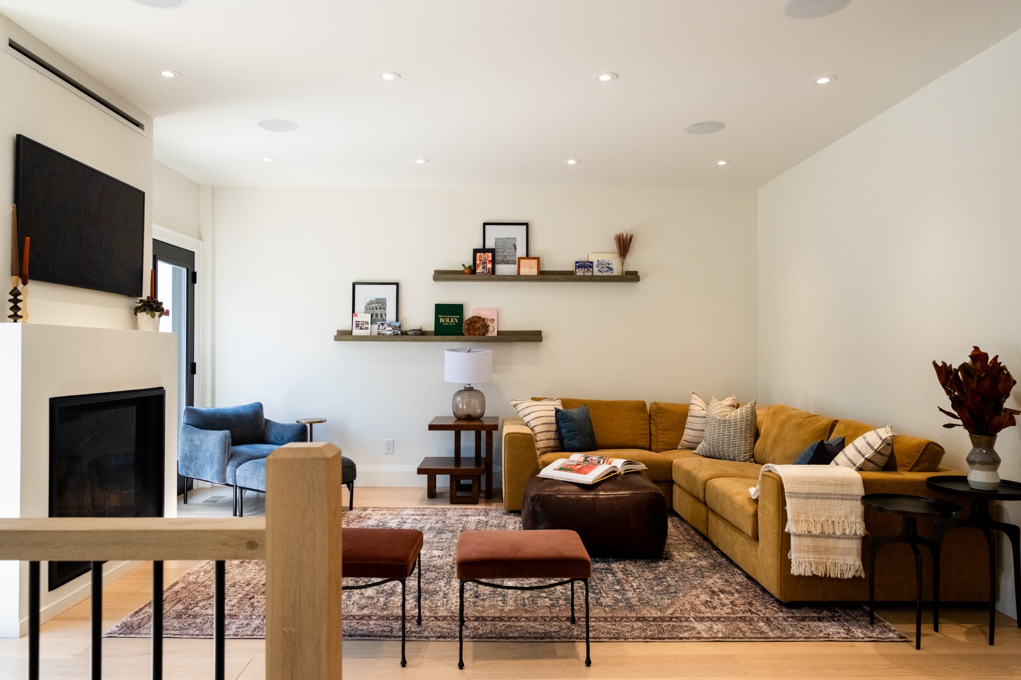 Professional real estate photograph of a bright open living room